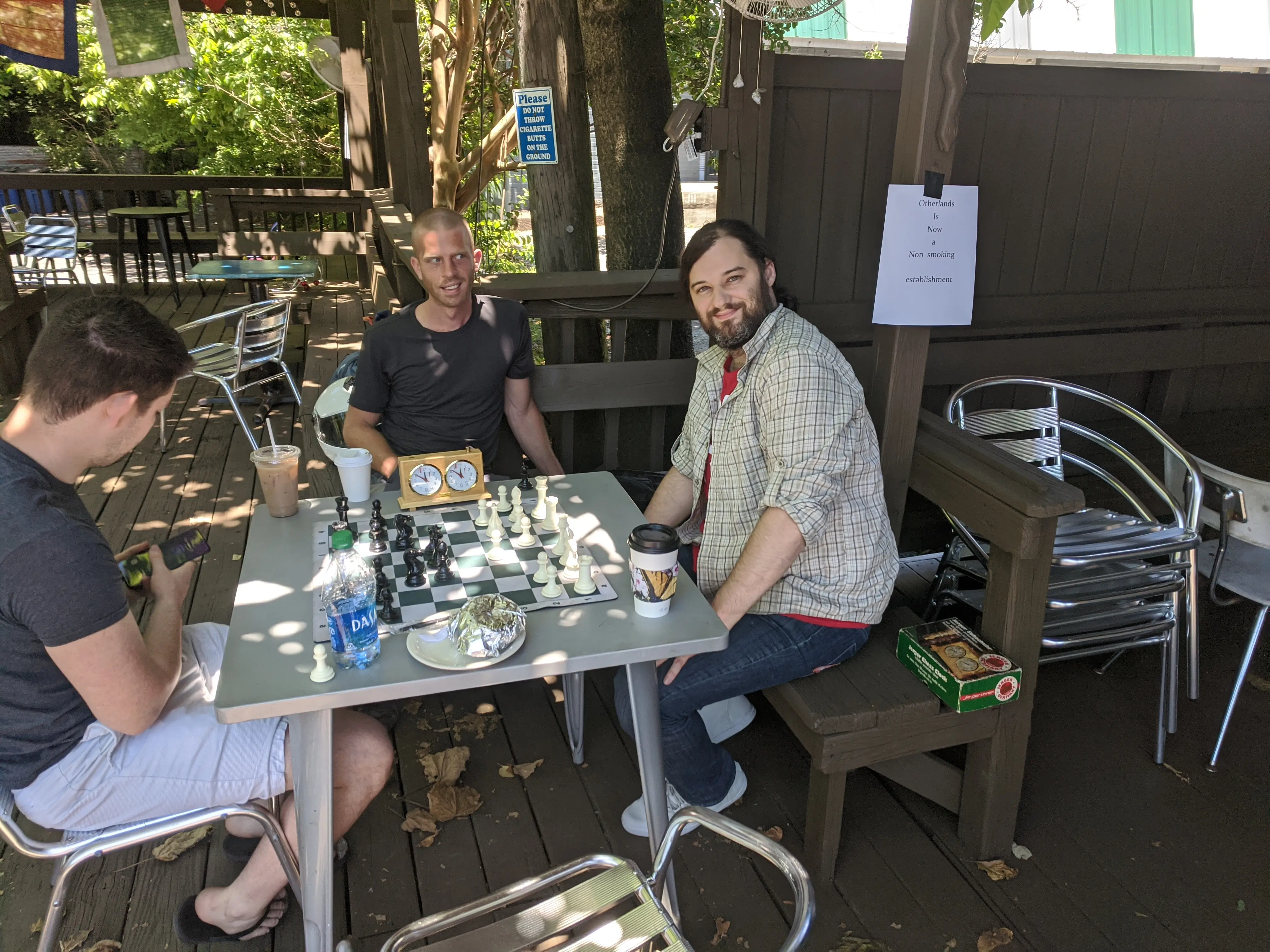 Private event guests socializing inside Otherlands Coffee Bar in Memphis