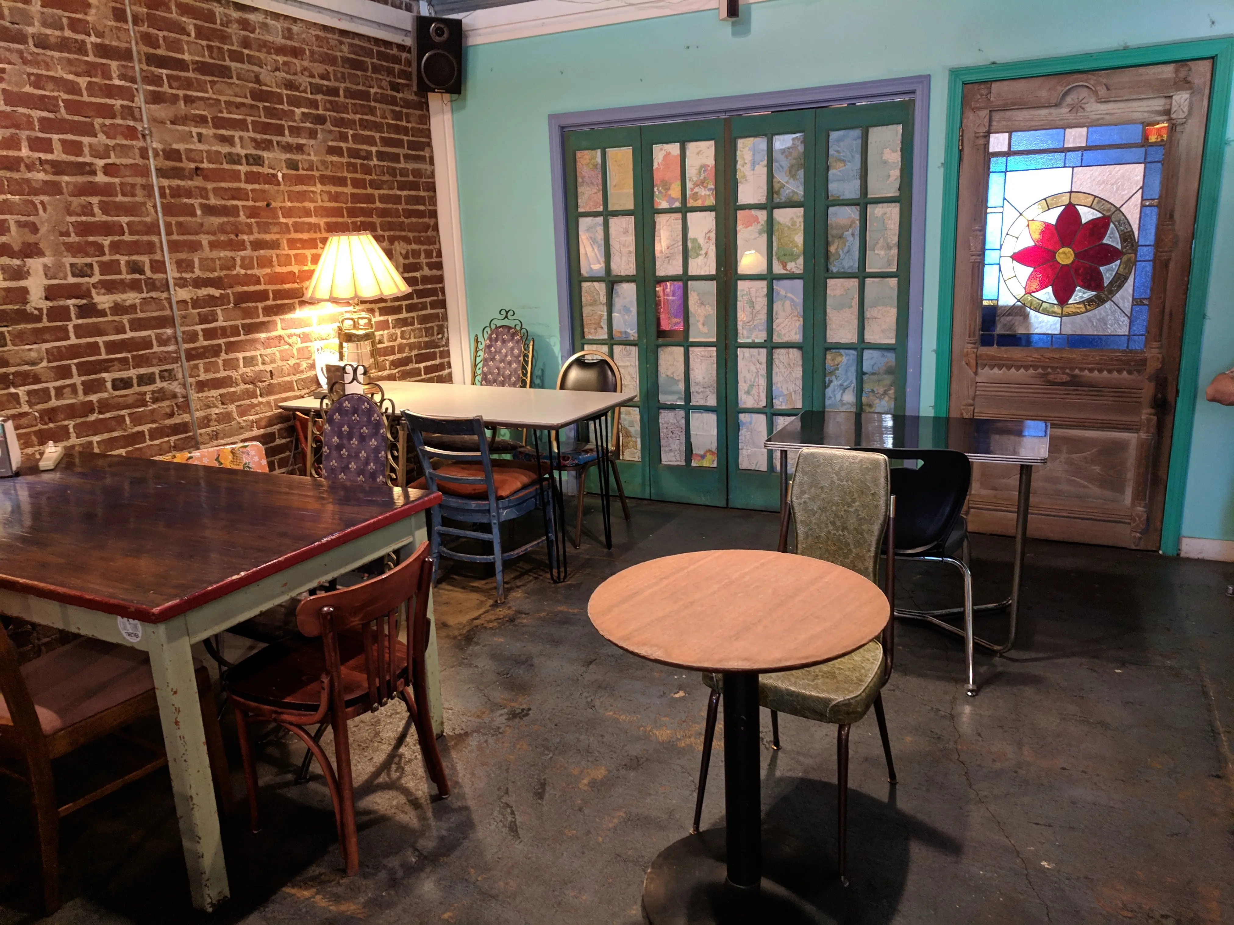 Private event guests socializing inside Otherlands Coffee Bar in Memphis